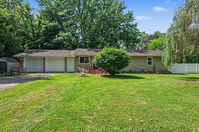 Nestled on 2 beautiful acres, this spacious ranch offers the - photo 1