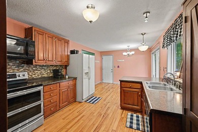 Nestled on 2 beautiful acres, this spacious ranch offers the - photo 8