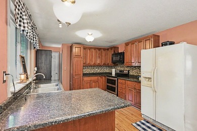 Nestled on 2 beautiful acres, this spacious ranch offers the - photo 9