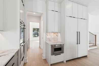 This gorgeous, newly completed new construction offers quality