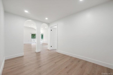 Welcome to this sprawling sunlit ranch with vaulted ceilings and - photo 16