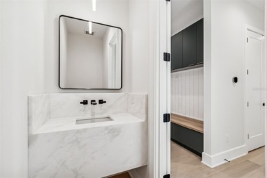 This gorgeous, newly completed new construction offers quality