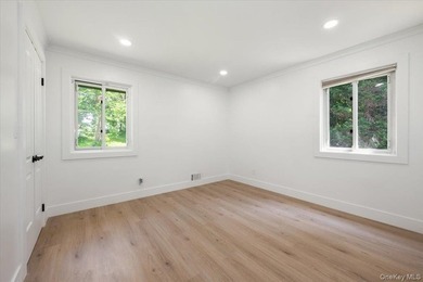 Welcome to this sprawling sunlit ranch with vaulted ceilings and - photo 18
