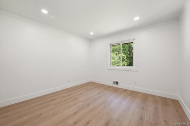 Welcome to this sprawling sunlit ranch with vaulted ceilings and - photo 19