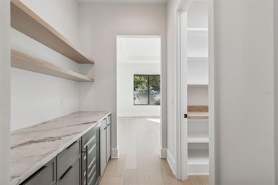 This gorgeous, newly completed new construction offers quality