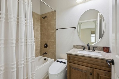 This exceptional home features a thoughtfully designed tri-split - photo 14