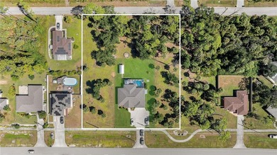 Beautiful pool home on 1.37 acres located on the border between - photo 5