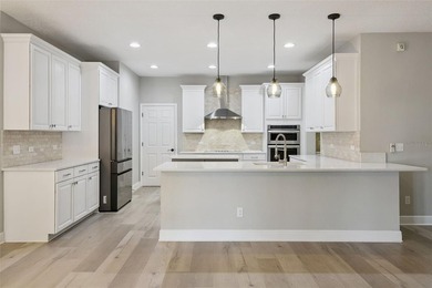 This exceptional home features a thoughtfully designed tri-split - photo 19