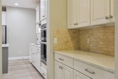 This exceptional home features a thoughtfully designed tri-split - photo 27