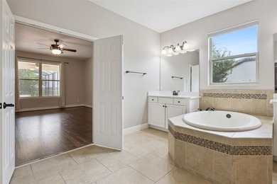 This exceptional home features a thoughtfully designed tri-split - photo 31