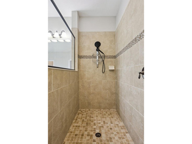 This exceptional home features a thoughtfully designed tri-split - photo 34
