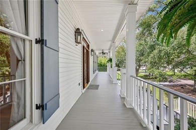 Charming and beautifully updated, this Old Mandeville gem is