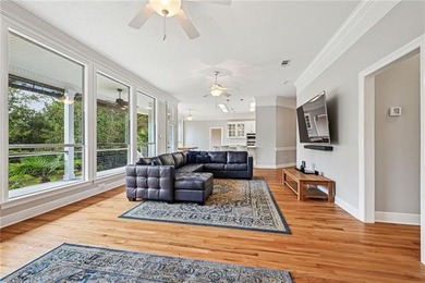 Charming and beautifully updated, this Old Mandeville gem is