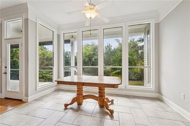 Charming and beautifully updated, this Old Mandeville gem is