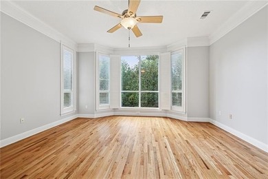 Charming and beautifully updated, this Old Mandeville gem is