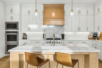 Located in The Tribute, 8760 Scottys Lake Lane combines elegant - photo 12