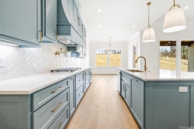 Welcome home to this stunning brand-new construction nestled - photo 13