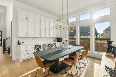 Located in The Tribute, 8760 Scottys Lake Lane combines elegant - photo 14