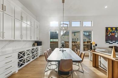 Located in The Tribute, 8760 Scottys Lake Lane combines elegant - photo 15