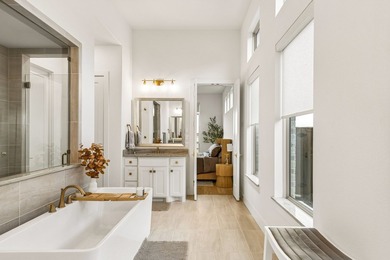 Located in The Tribute, 8760 Scottys Lake Lane combines elegant - photo 19
