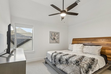 Located in The Tribute, 8760 Scottys Lake Lane combines elegant - photo 21