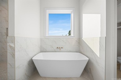 Welcome home to this stunning brand-new construction nestled - photo 25