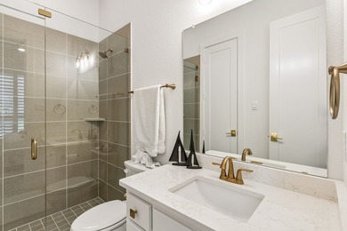 Located in The Tribute, 8760 Scottys Lake Lane combines elegant - photo 25
