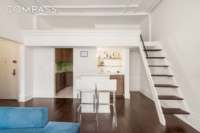 *Welcome to this charming 25 ft wide townhouse co-op with an - photo 7