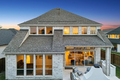 Located in The Tribute, 8760 Scottys Lake Lane combines elegant - photo 36