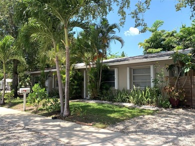 Exceptional corner-lot duplex in sought-after Tarpon River - photo 1