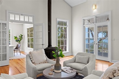 Virtually Staged. Welcome to a reimagined waterfront estate on - photo 11