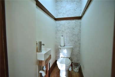 Discover The Charm and Comfort of this Inviting 3 Bedroom 1.5 - photo 12