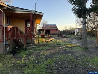 This property features 4 bedrooms and 2 bathrooms, a spacious