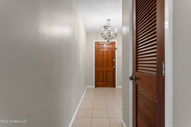 This well-maintained 4-bedroom, 2-bath brick home is situated on - photo 6