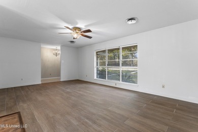 This well-maintained 4-bedroom, 2-bath brick home is situated on - photo 8
