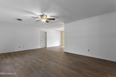 This well-maintained 4-bedroom, 2-bath brick home is situated on - photo 10