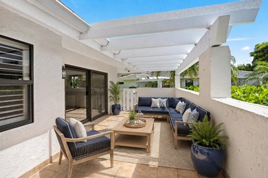 Tucked away in the picturesque Windward Village enclave of - photo 11