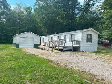 Lake Home For Sale in Houghton Lake, Michigan