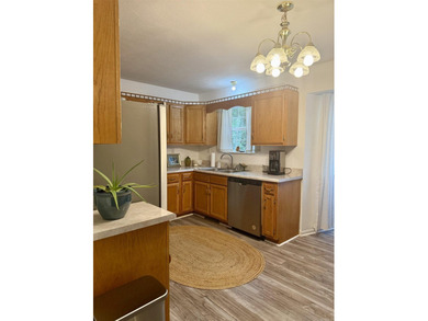 Looking for a lake getaway? This charming 3-bedroom, 1.5-bath - photo 10