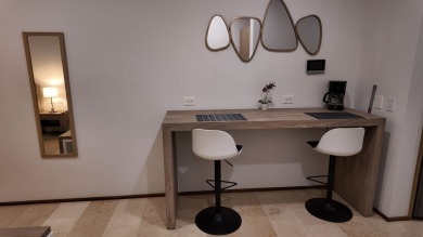 Located just steps from the vibrant 5th Avenue and one block