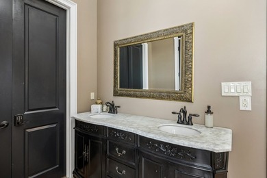Set at the end of a private drive, this custom-built home sits - photo 26