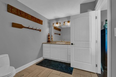 Set at the end of a private drive, this custom-built home sits - photo 35
