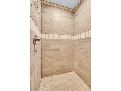 Set at the end of a private drive, this custom-built home sits - photo 37