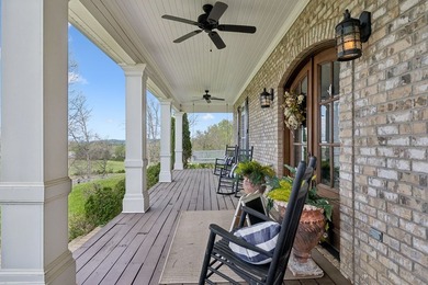 Set at the end of a private drive, this custom-built home sits - photo 41