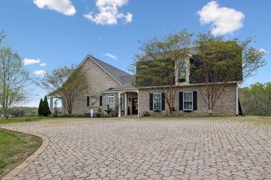 Set at the end of a private drive, this custom-built home sits - photo 43