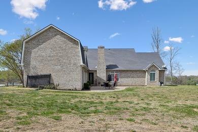 Set at the end of a private drive, this custom-built home sits - photo 46
