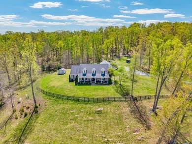 Set at the end of a private drive, this custom-built home sits - photo 49