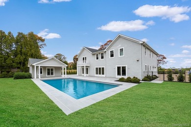 Presenting an exceptional new Hamptons estate, currently under - photo 1