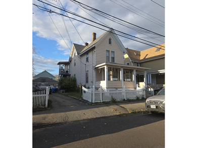 Updated Colonial with In-Law Apartment. Beautifully renovated - photo 1