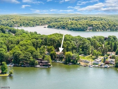 Custom lakefront chalet offering deep-water frontage, an - photo 1